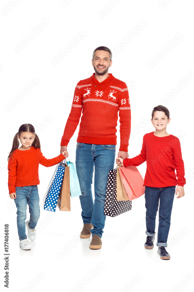 Obraz premium father and children with shopping bags