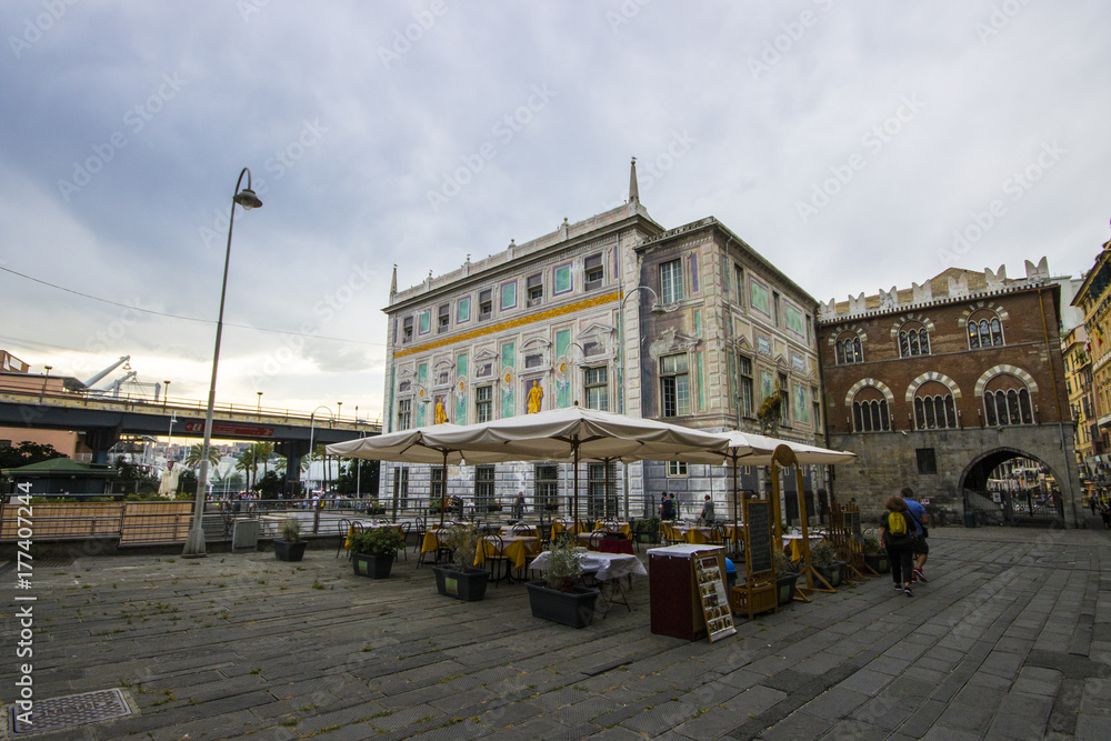 Fototapeta premium The Palazzo San Giorgio or Palace of St. George near the strada sopraelevata. Port of Genoa, Italy