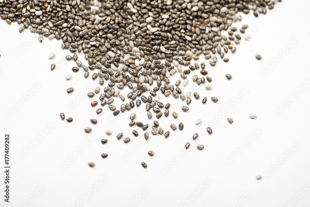 Chia seeds on white background. Isolated. Copy space. Chia seeds on white background. Isolated. Copy space.