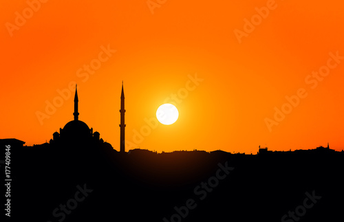 silhouette of the mosque with minarets at sunset in Istanbul