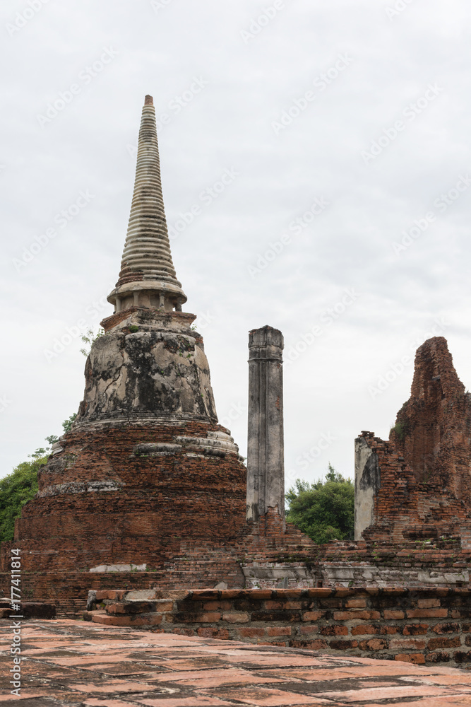 Ancient pagoda with ruin in foreground at Wat Mahathat, Ayutthaya