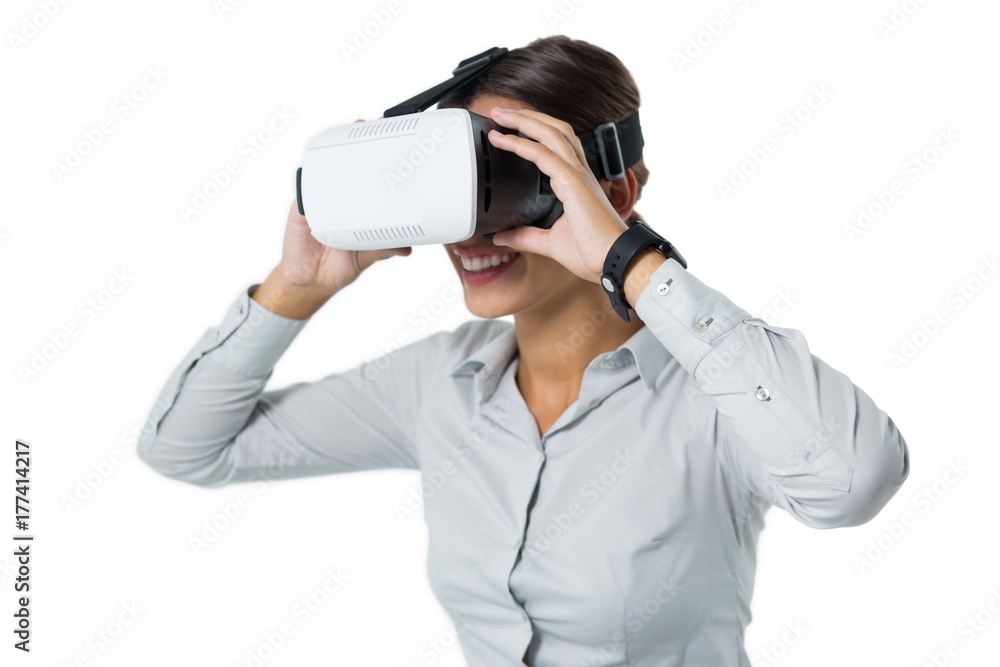 Female executive using virtual reality headset Female executive using virtual reality headset
