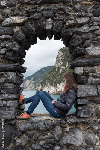 Girl looking into the sea