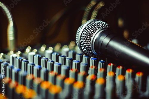 the microphone lies on the mixer photo