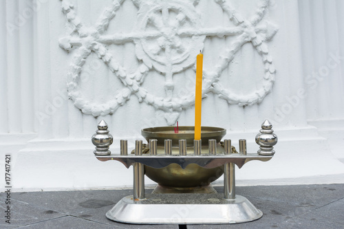 Candle Stick and Insense Burner on the Temple Floor.