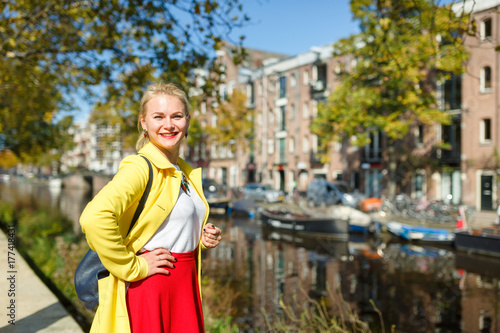 Cheerful young woman in Amsterdam