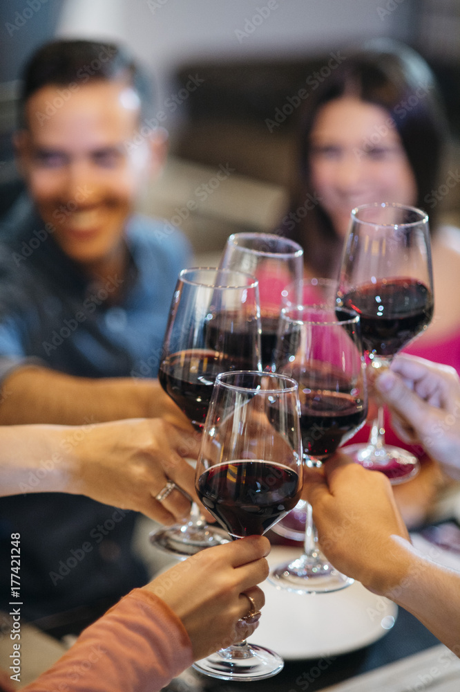 friends toasting with wine