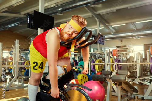 Tired man at the gym photo