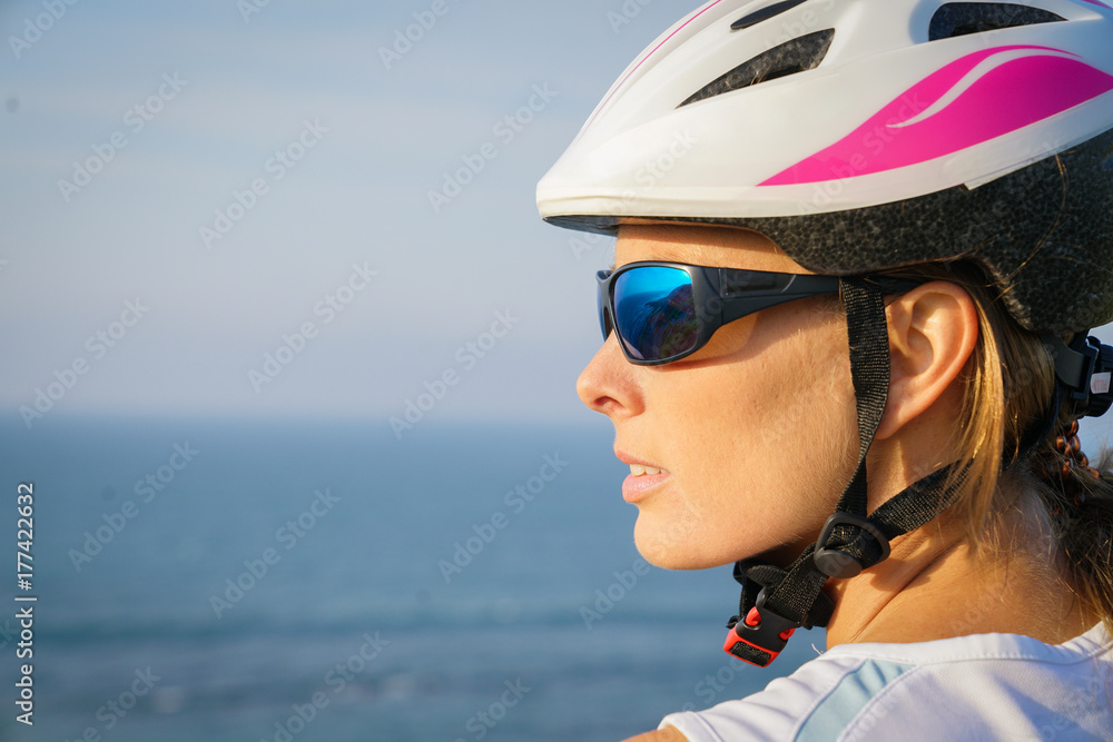 Enjoying a relaxing biking ride on the seaside Enjoying a relaxing biking ride on the seaside