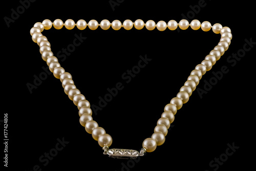 Antique Ladies String of Pearls Isolated on Black background