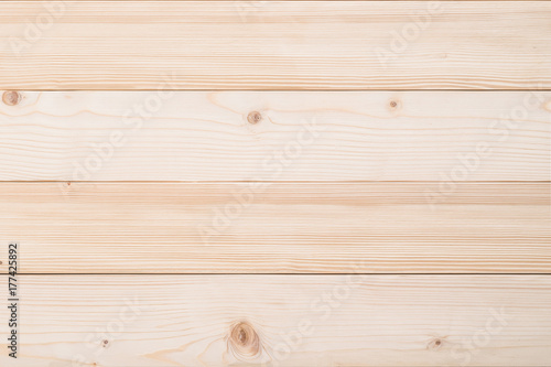 White Finland pine wood woodgrain texture background in natural beige brown color