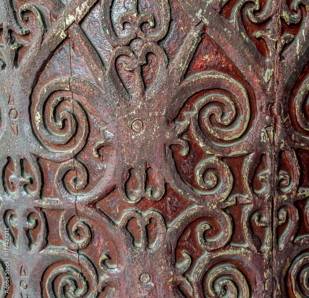 closeup of dayaknese traditional wood sculpture