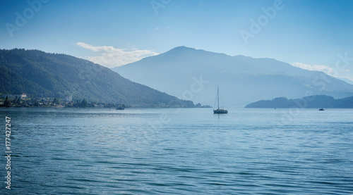 Swiss lake zug with boats and ferry and blue sky