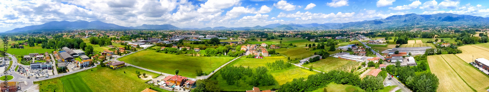 Aerial panoramic view of Lucca Countryside. City and mountains, Tuscany - Italy Aerial panoramic view of Lucca Countryside. City and mountains, Tuscany - Italy