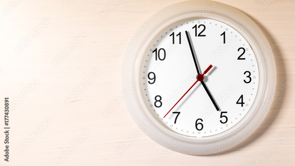 Clock ticking showing five hours Clock ticking showing five hours