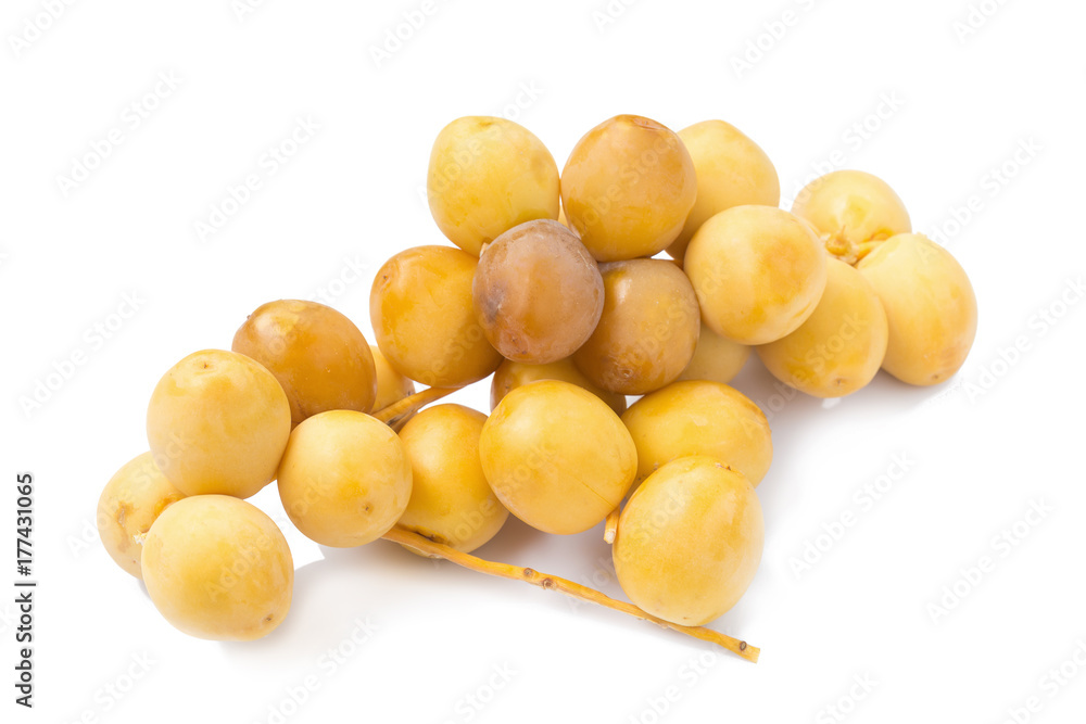 yellow raw dates isolated on white background yellow raw dates isolated on white background