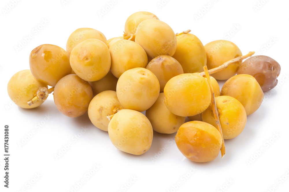 yellow raw dates isolated on white background yellow raw dates isolated on white background
