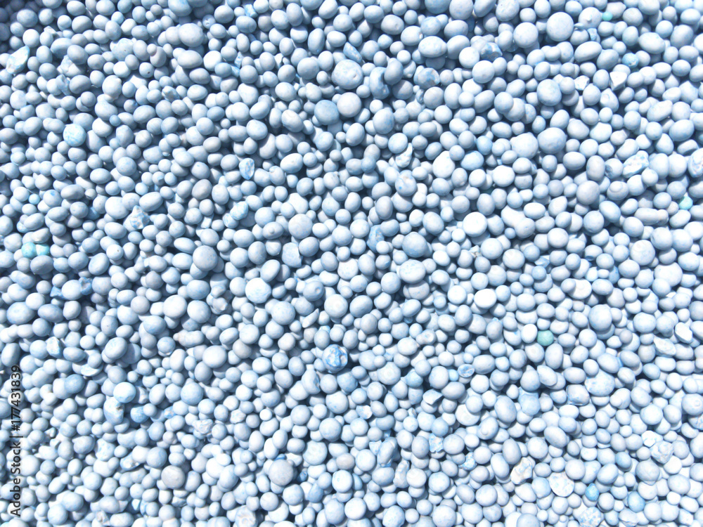 Blue fertilizer background. Blue fertilizer background.