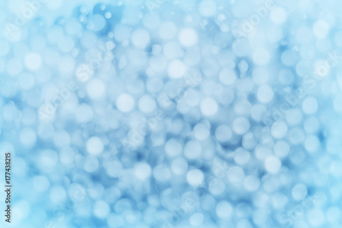 Blue bokeh abstract light background.