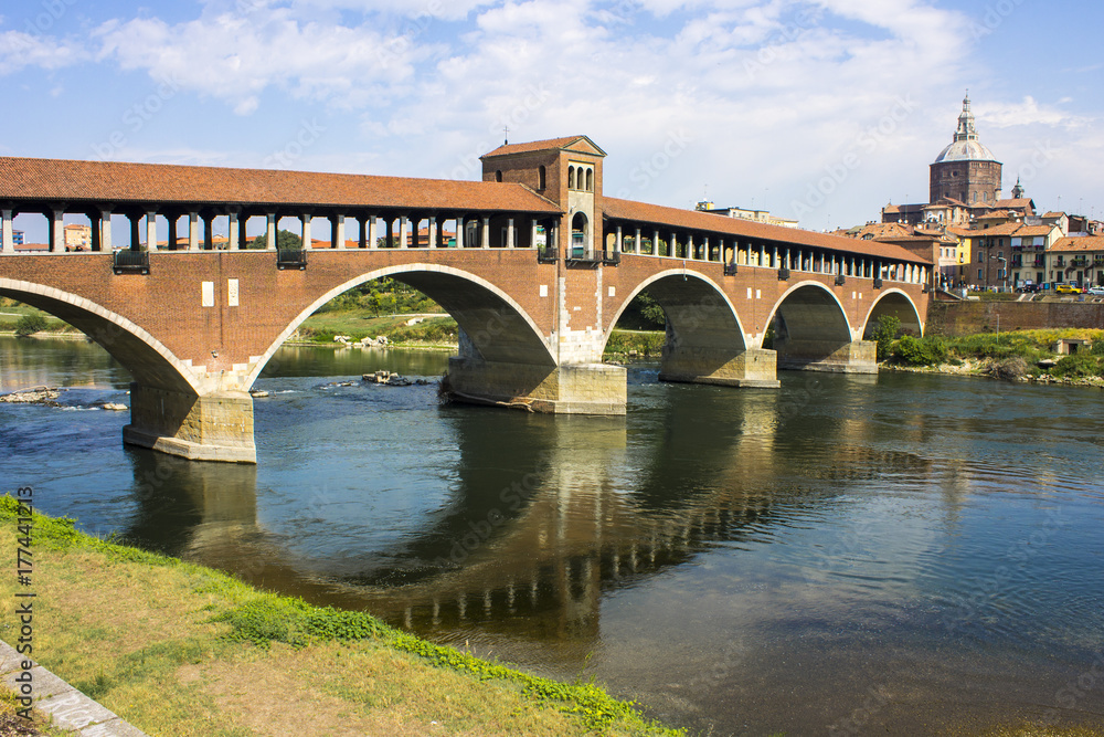 The Ponte Coperto (covered bridge), also known as the Ponte Vecchio (old bridge), a brick and stone arch bridge over the Ticino River in Pavia, Italy