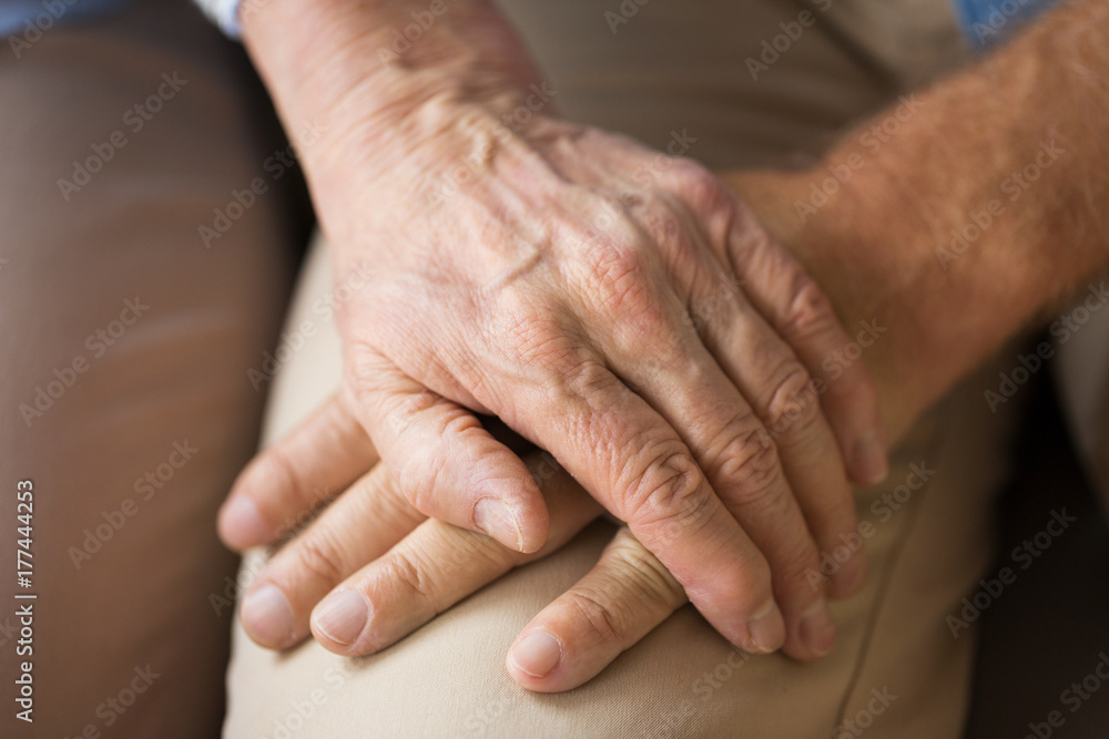 close up of senior couple holding hands close up of senior couple holding hands