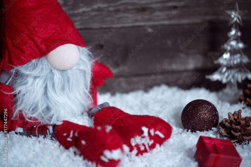 Christmas dwarf on snow with Christmas decorative. Christmas dwarf on snow with Christmas decorative.