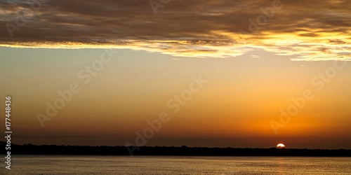 Vivid Yellow Cloud Orange Sky Sunrise Seascape Australia.