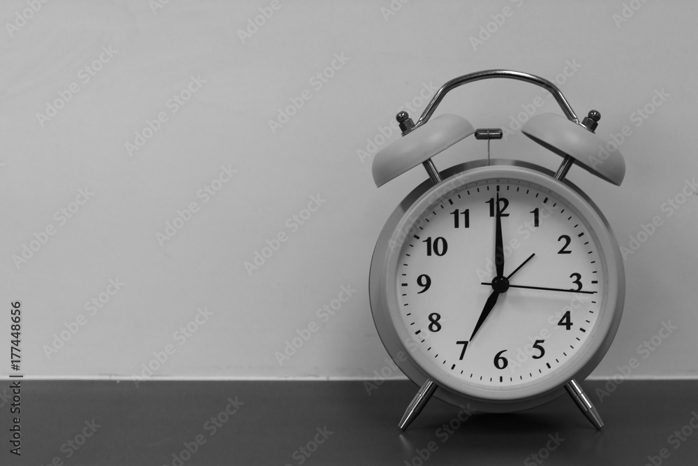 Black and white of clock on the wooden board. Black and white of clock on the wooden board.