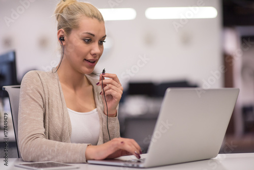 businesswoman using a laptop in startup office