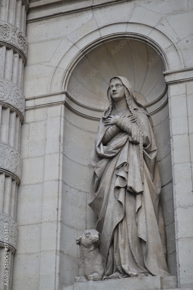 Statue of saint Genevieve, patron of Paris, at saint Stephen Catholic church, religious landmark in the 5th arrondissement, Paris, France
