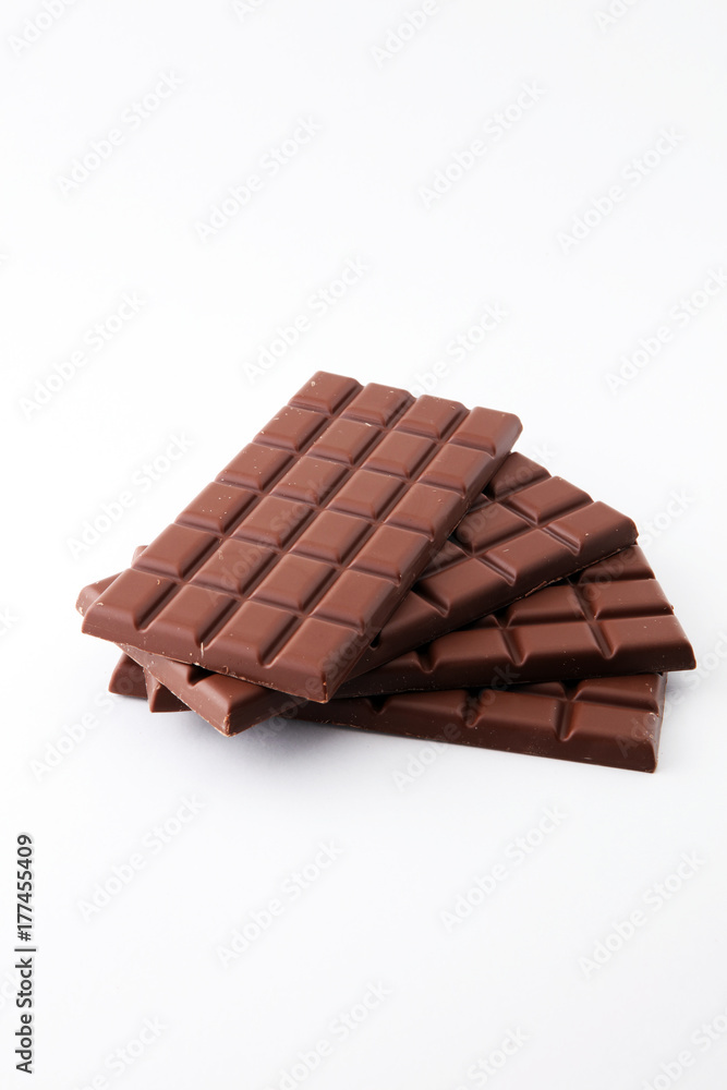 close up of chocolate bars isolated on white background. close up of chocolate bars isolated on white background.