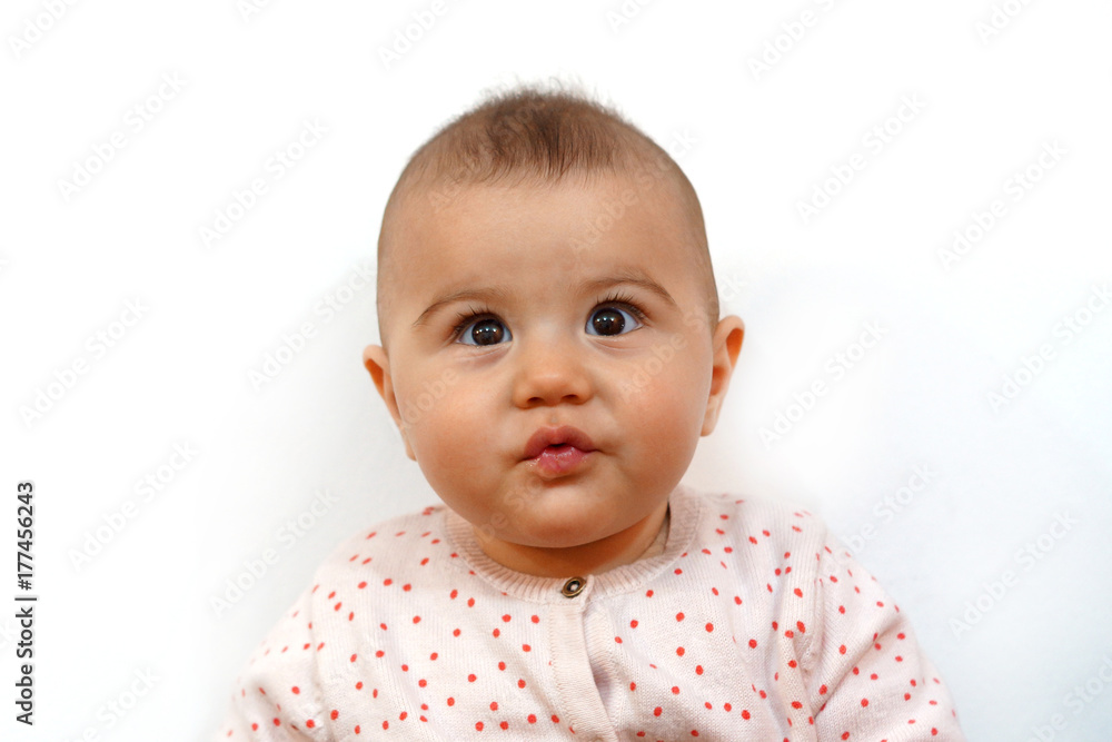 Baby girl portrait on white background