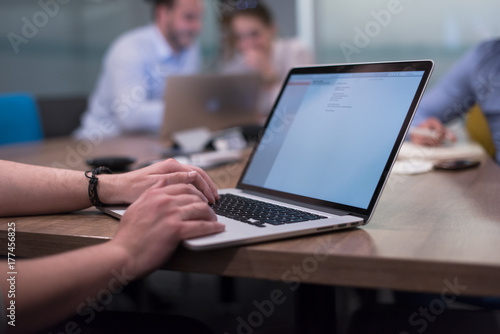 Startup Business Team At A Meeting at modern office building