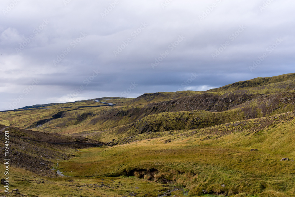 Fototapeta premium Hills with curvy road
