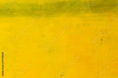 Close up of yellow abstract art painting.