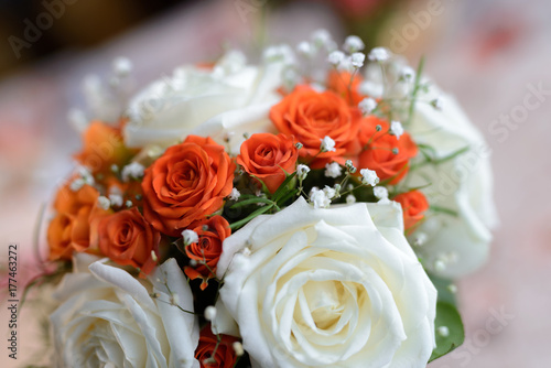 Close-up view of beautiful bouquet of roses and succulents photo