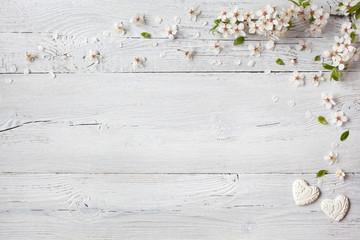 Background with hearts and blooming branches cherry, plum