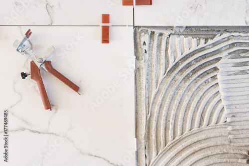 overhead view of tile glue and tiles photo