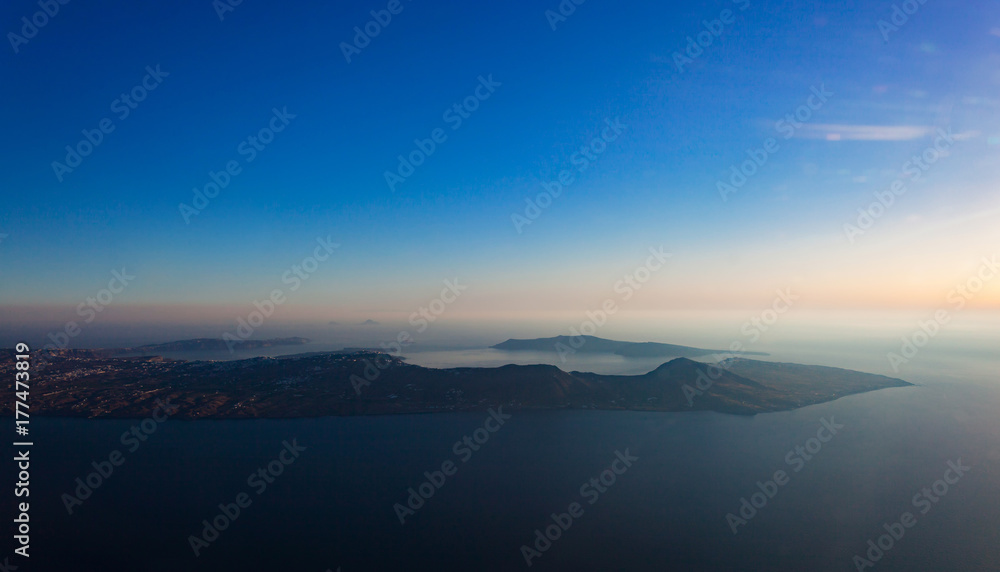 Aerial view of Santorini island as seen from plane window