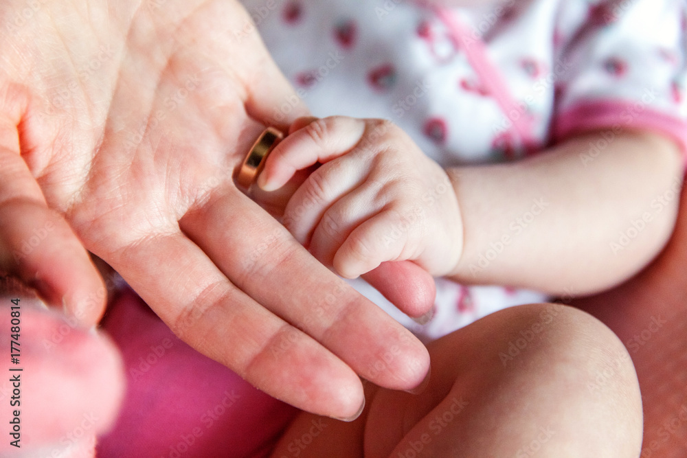 Little baby holding mother's hand Little baby holding mother's hand