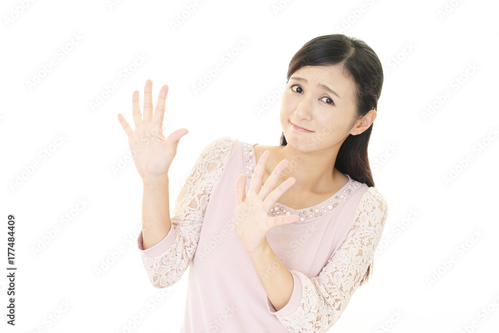ストップのジェスチャーをする女性 ストップのジェスチャーをする女性