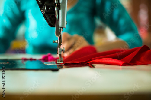 Close-up Sewing Machine Red fabric photo