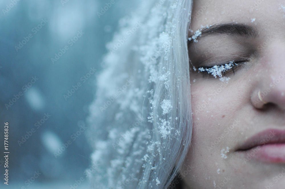 Woman standing in the snow Woman standing in the snow