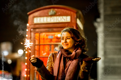 Sticker Woman night portrait in Christmas time, London