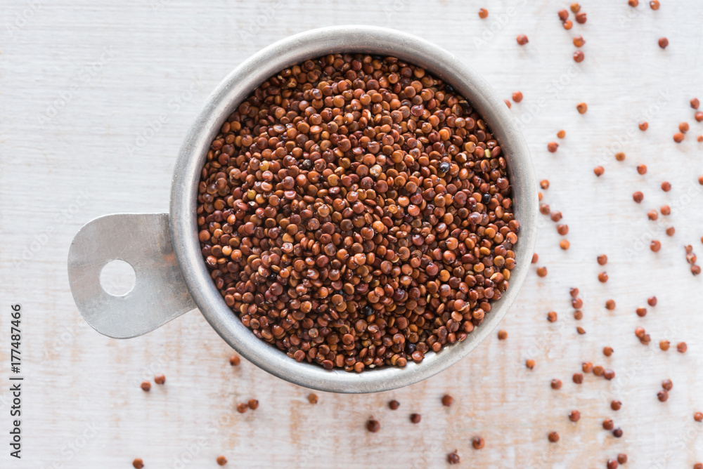 Red Quinoa in a Measuring Cup Red Quinoa in a Measuring Cup