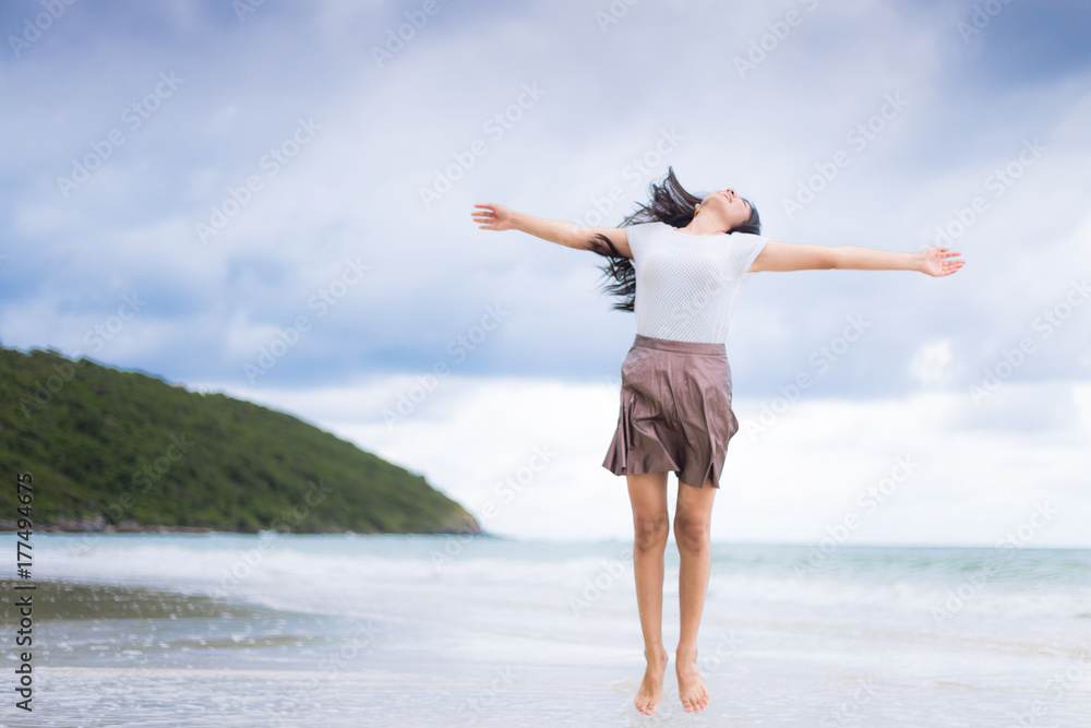 Beautiful Asian woman vacation on beach of Thailand Beautiful Asian woman vacation on beach of Thailand