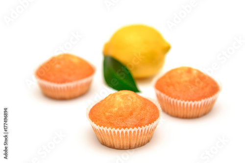 Lemon muffins on white background