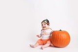 Baby dressed up in Orange Festive Halloween Outfit