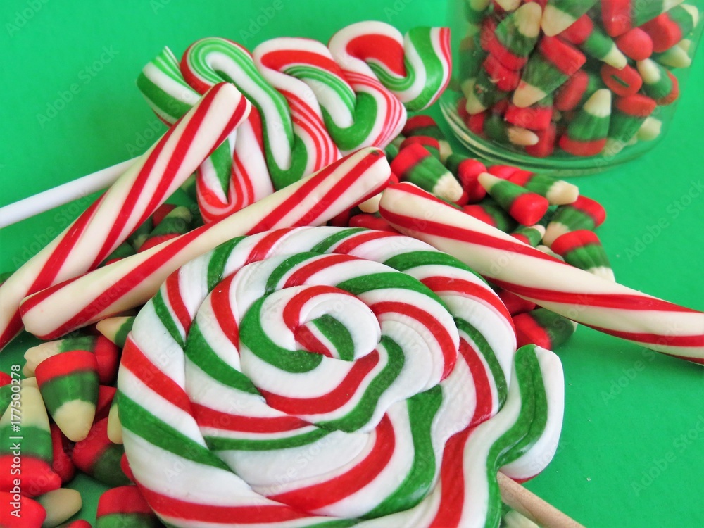 Christmas candy variety in red, white, and green with a green background