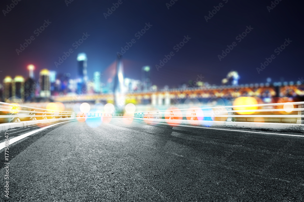 empty asphalt road with modern bridge and buildings empty asphalt road with modern bridge and buildings